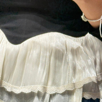 Chic Top with Layered Peplum Hem