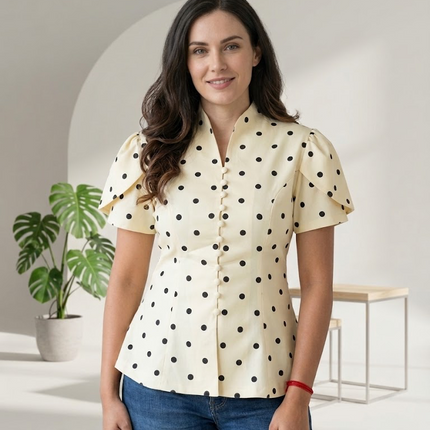 Sagar hill road white polka dot peplum top with button-front, short sleeves, and a flattering fitted waist.
