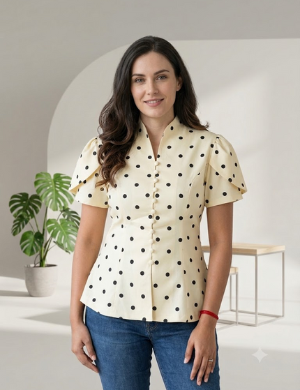 Sagar hill road white polka dot peplum top with button-front, short sleeves, and a flattering fitted waist.