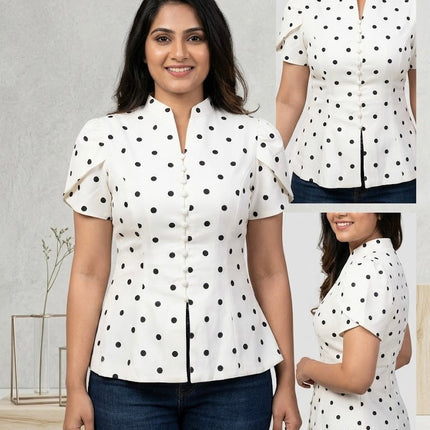 Sagar hill road white polka dot peplum top with button-front, mandarin collar, and short sleeves on a model