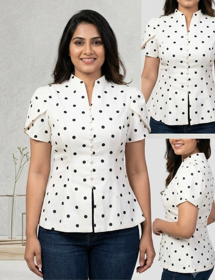 Sagar hill road white polka dot peplum top with button-front, mandarin collar, and short sleeves on a model